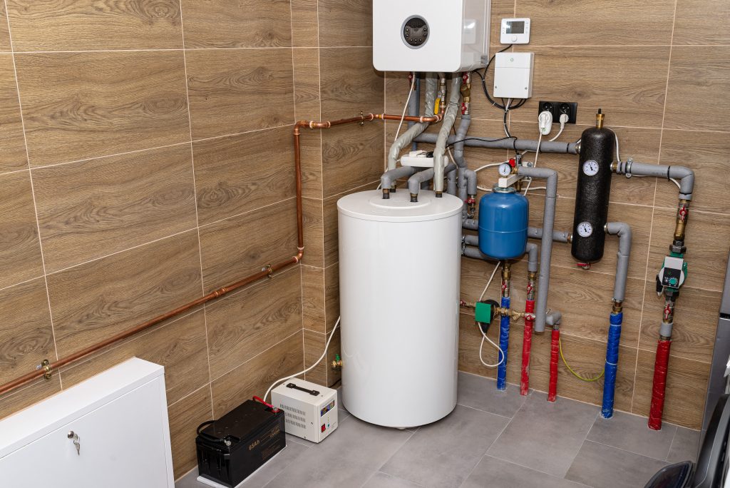 Traditional tank water heater in a residential home